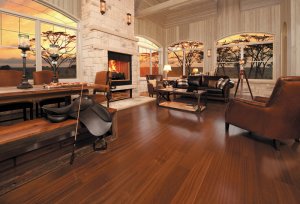 Formal living space with fireplace and mahogany hardwood floors