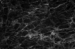 Marble is an elegant choice for stone flooring but it needs maintenance to preserve its color.